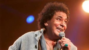 "Okaz" Reveals the Reason Behind Mohamed Mounir's Trip to Germany
